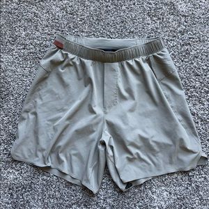 Tan lululemon mens surge lined shorts size medium 6 inch inseam
